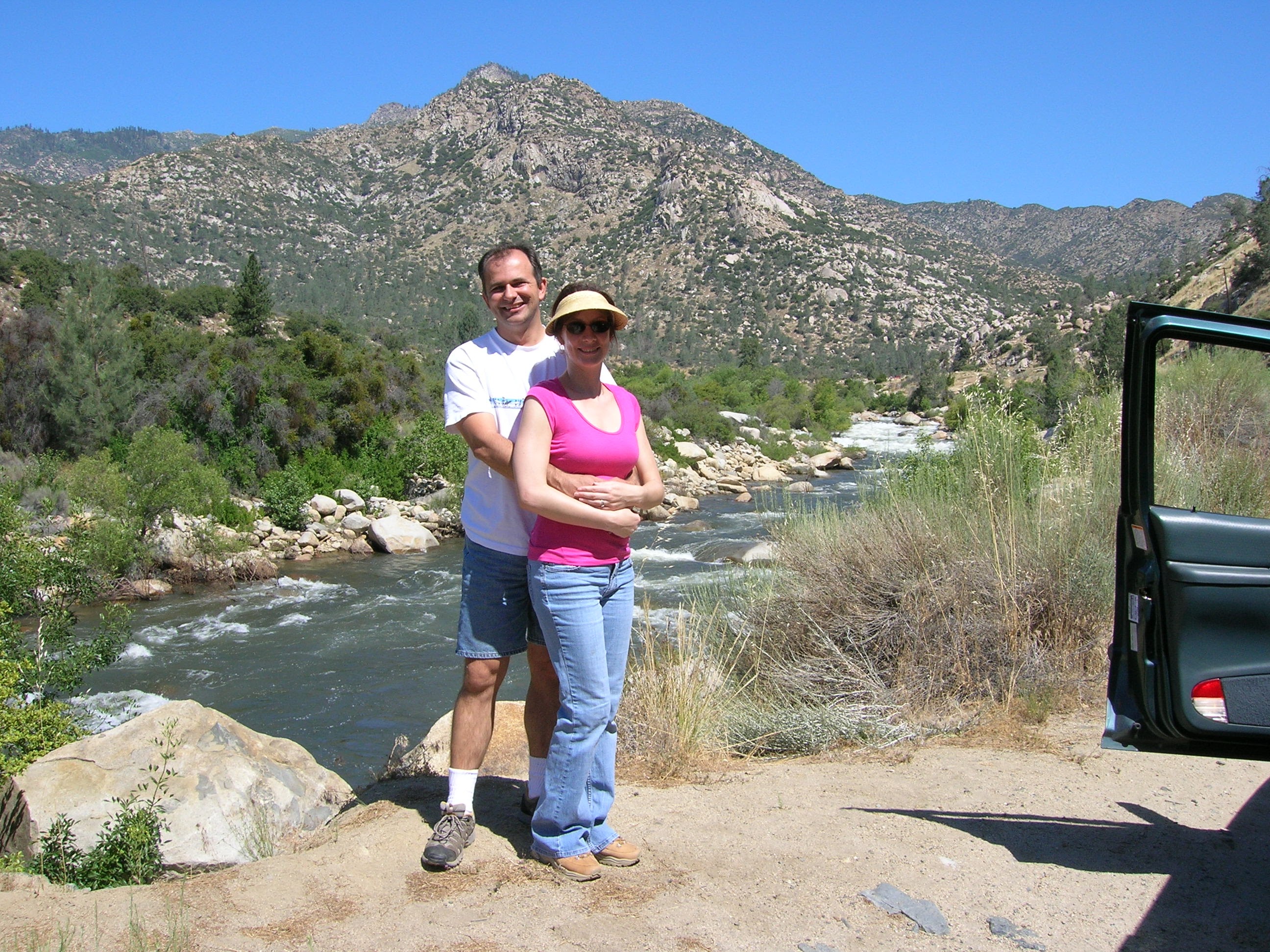 Themio embracing Christian near a mountain river, June 2005
