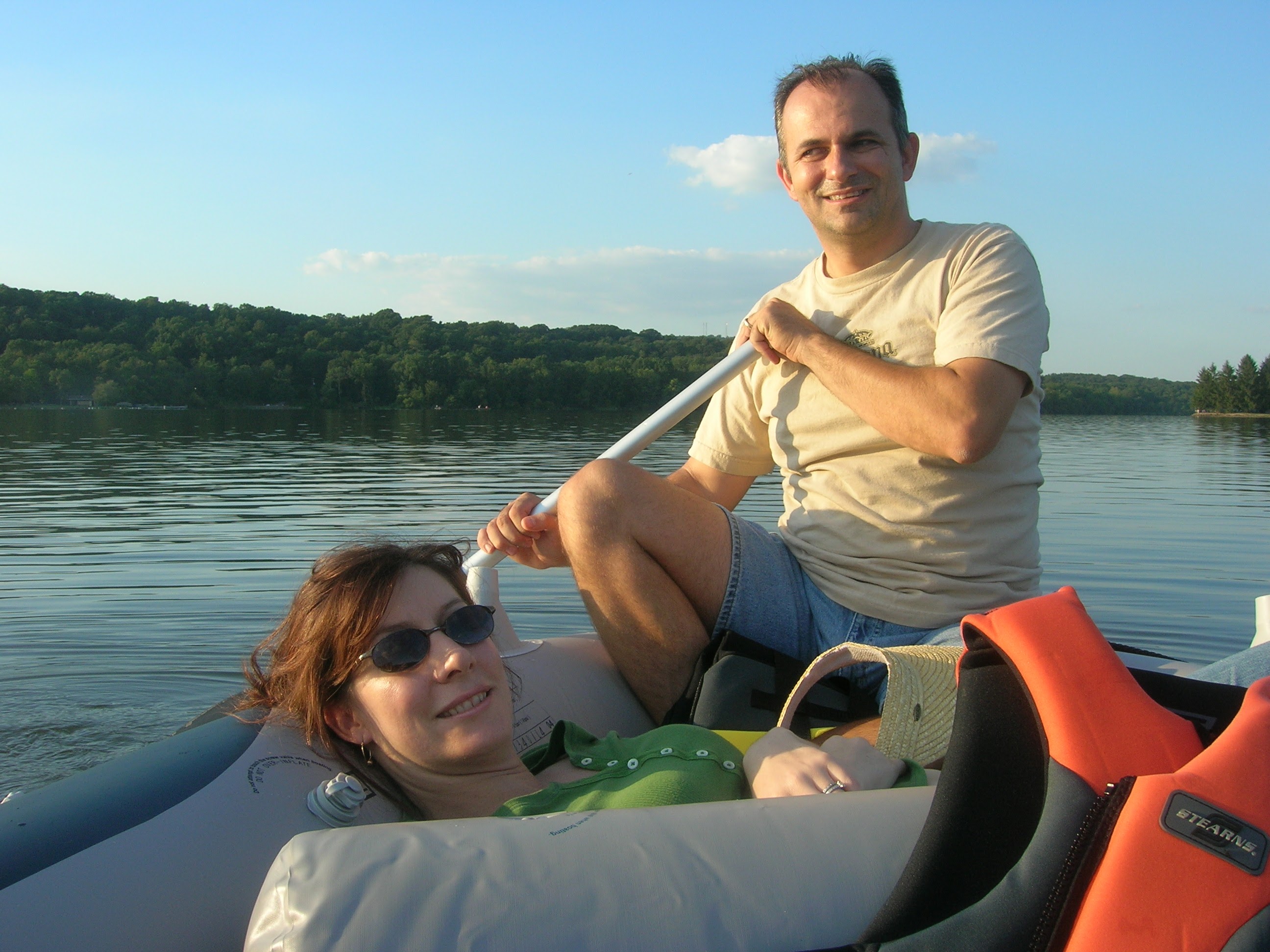 Themio and Christian in an inflatable boat on a lake, September 2005