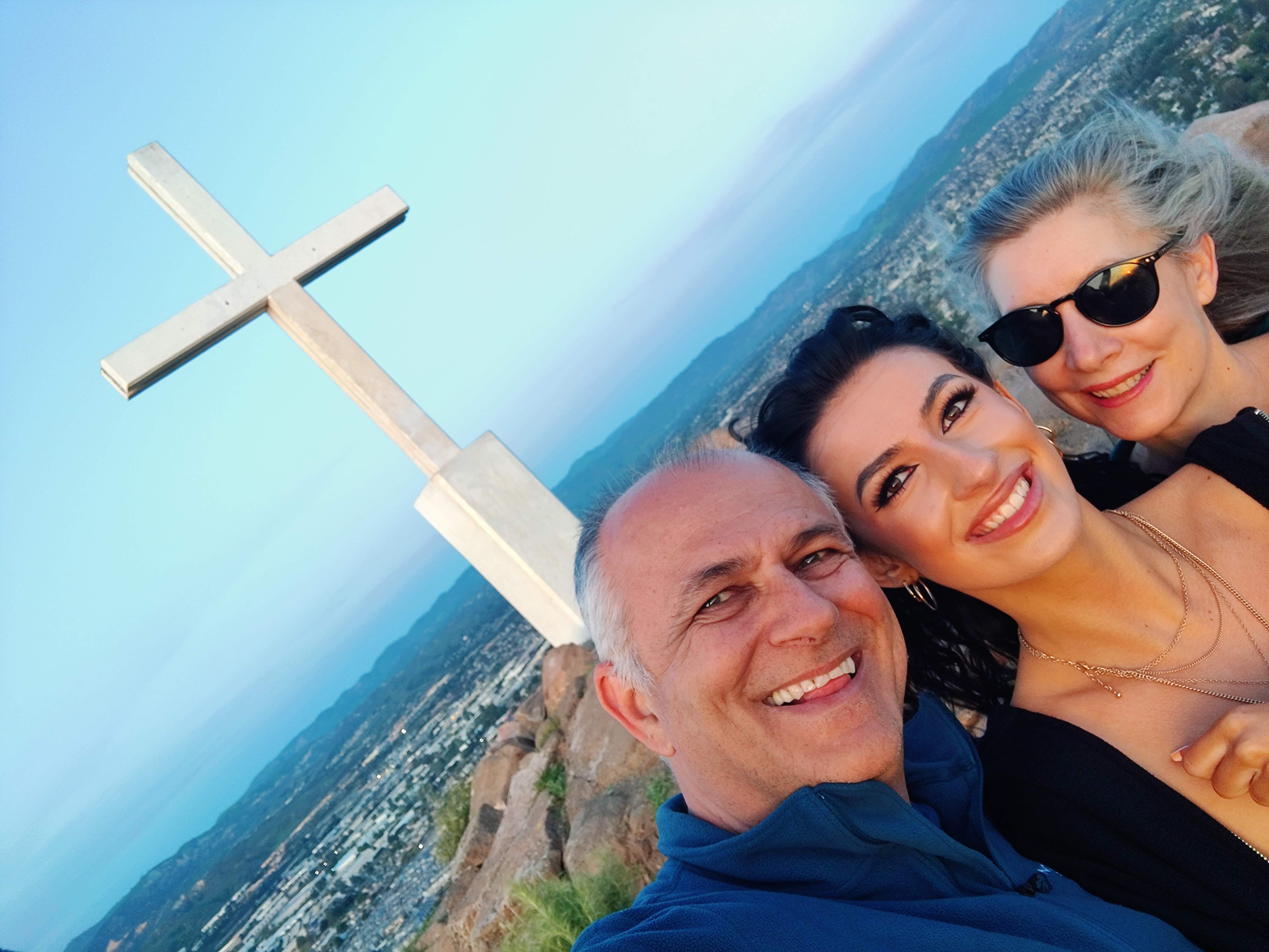 Themio, Christian, and Yiannoula at the cross overlook, April 2025