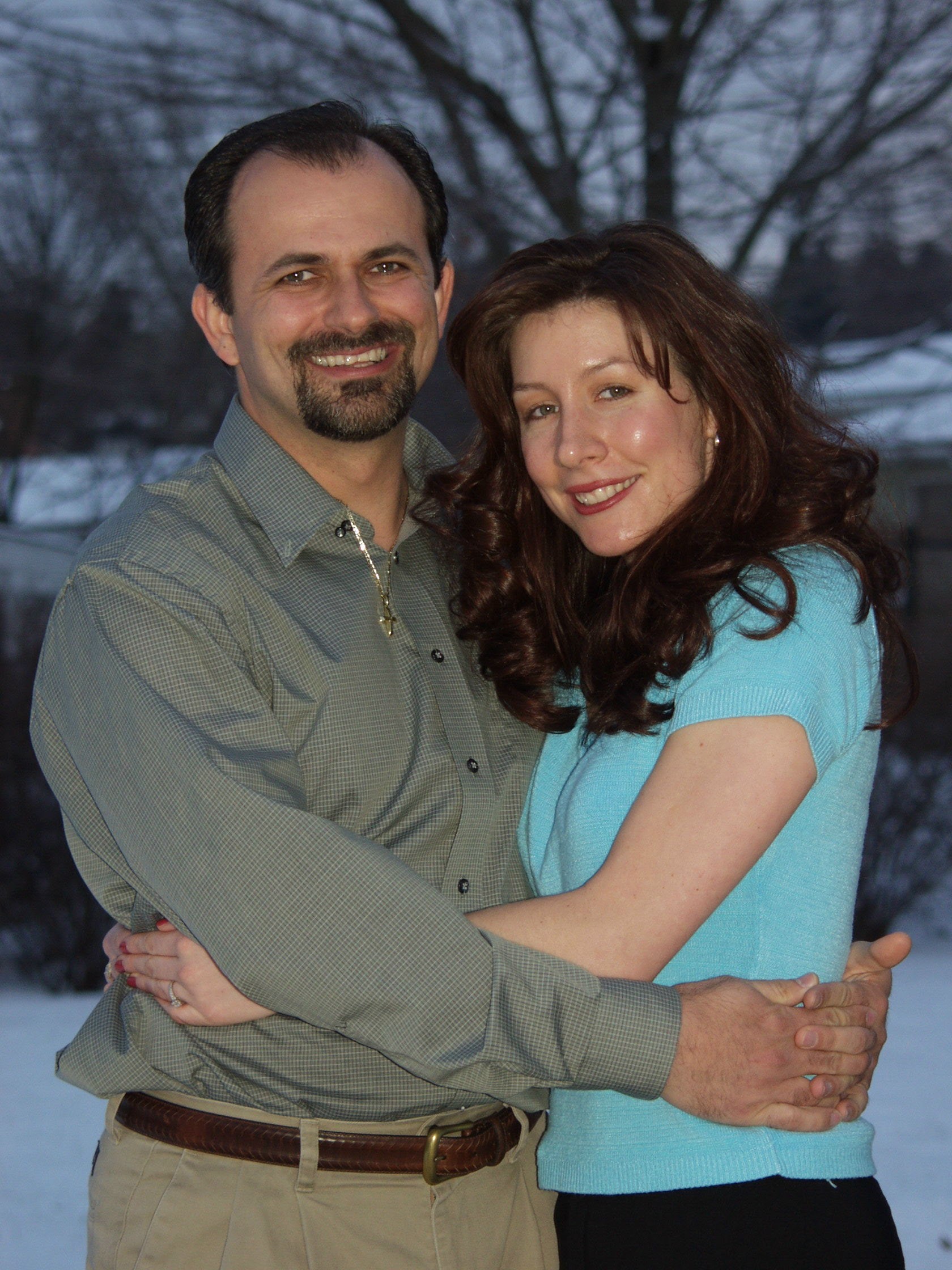 Themio and Christian embracing in the snow, January 2002