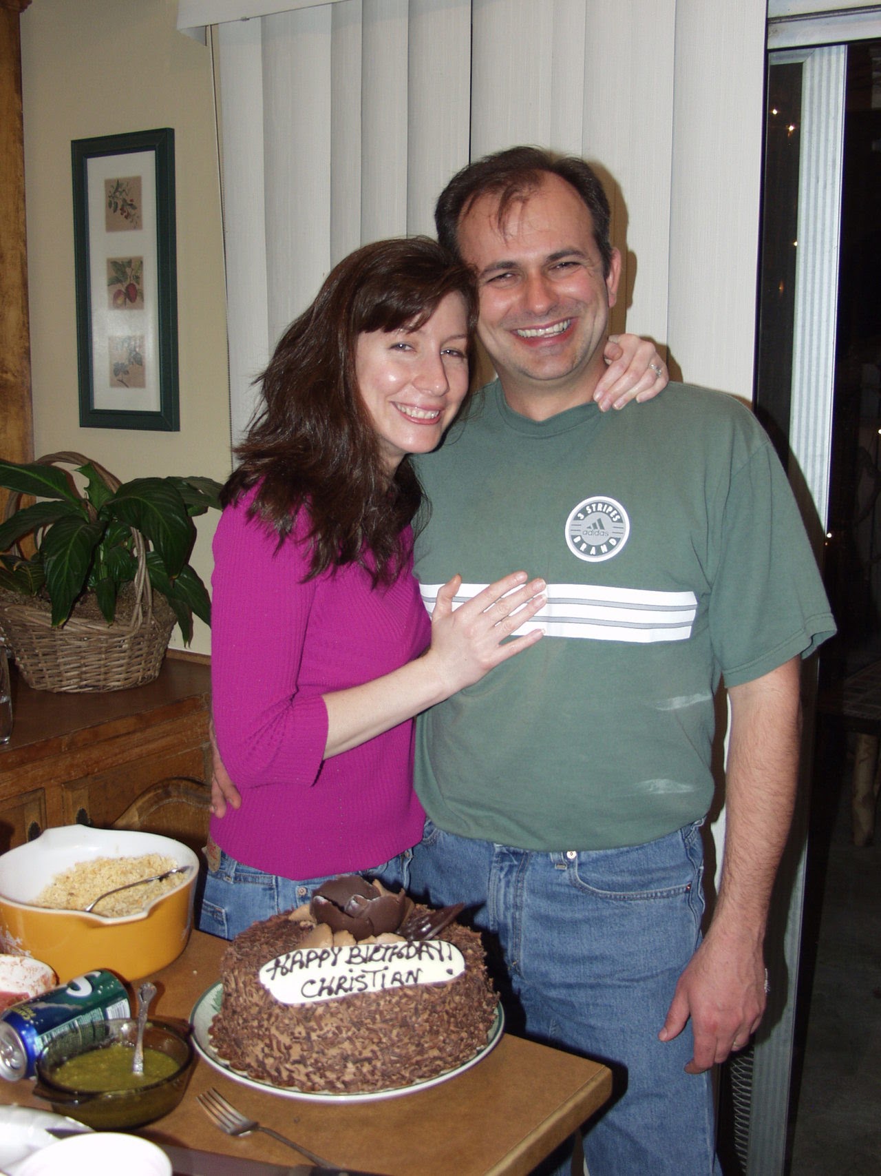 Themio celebrating Christian's birthday with cake, February 2004